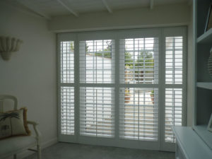White Shutters Blinds On French Doors